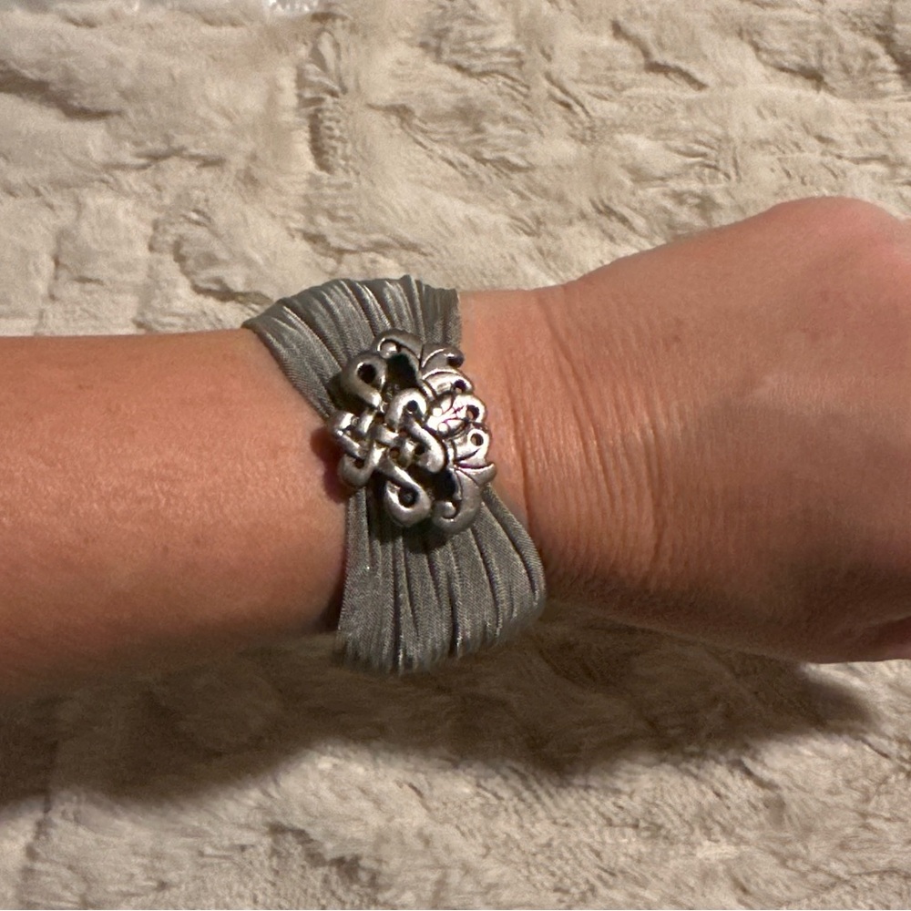 Elegant Sterling Silver Bracelet with Intricate Clasp